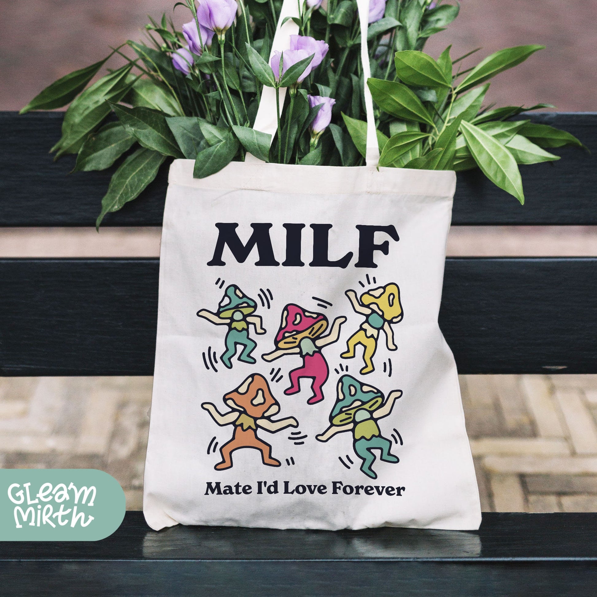 a white bag with a picture of people on it sitting on a bench