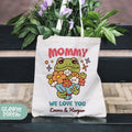 a white bag with a picture of a frog holding a bouquet of flowers