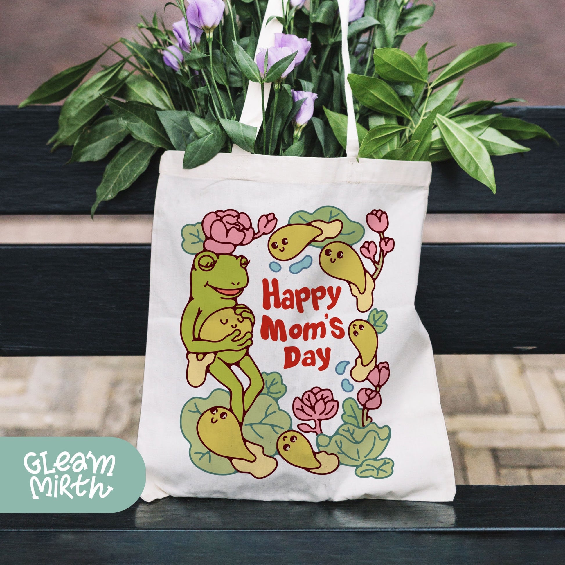 a tote bag sitting on top of a wooden bench