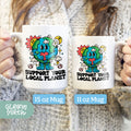 a woman holding two coffee mugs in her hands