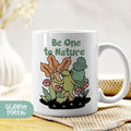 a coffee mug with a picture of a frog on it