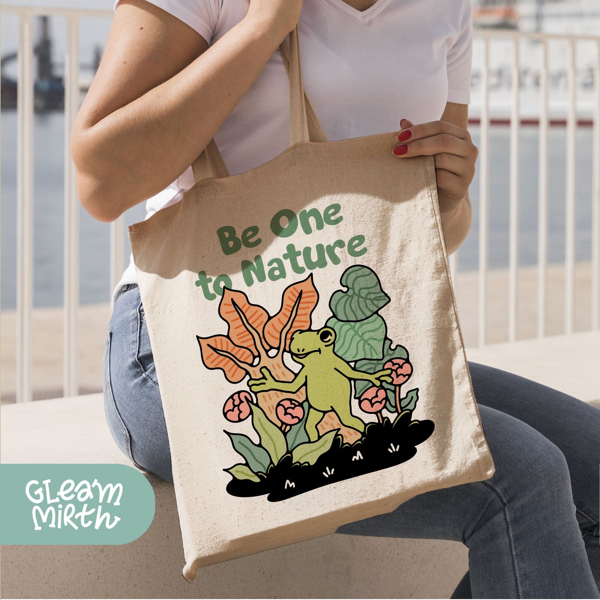 a woman sitting on a bench holding a tote bag