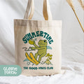 a tote bag with a picture of a frog on it