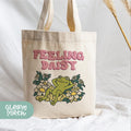 a tote bag with a frog on it