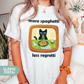 a woman wearing a t - shirt with a cat on it