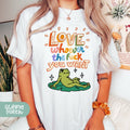 a woman wearing a t - shirt that says love without the fluk you want