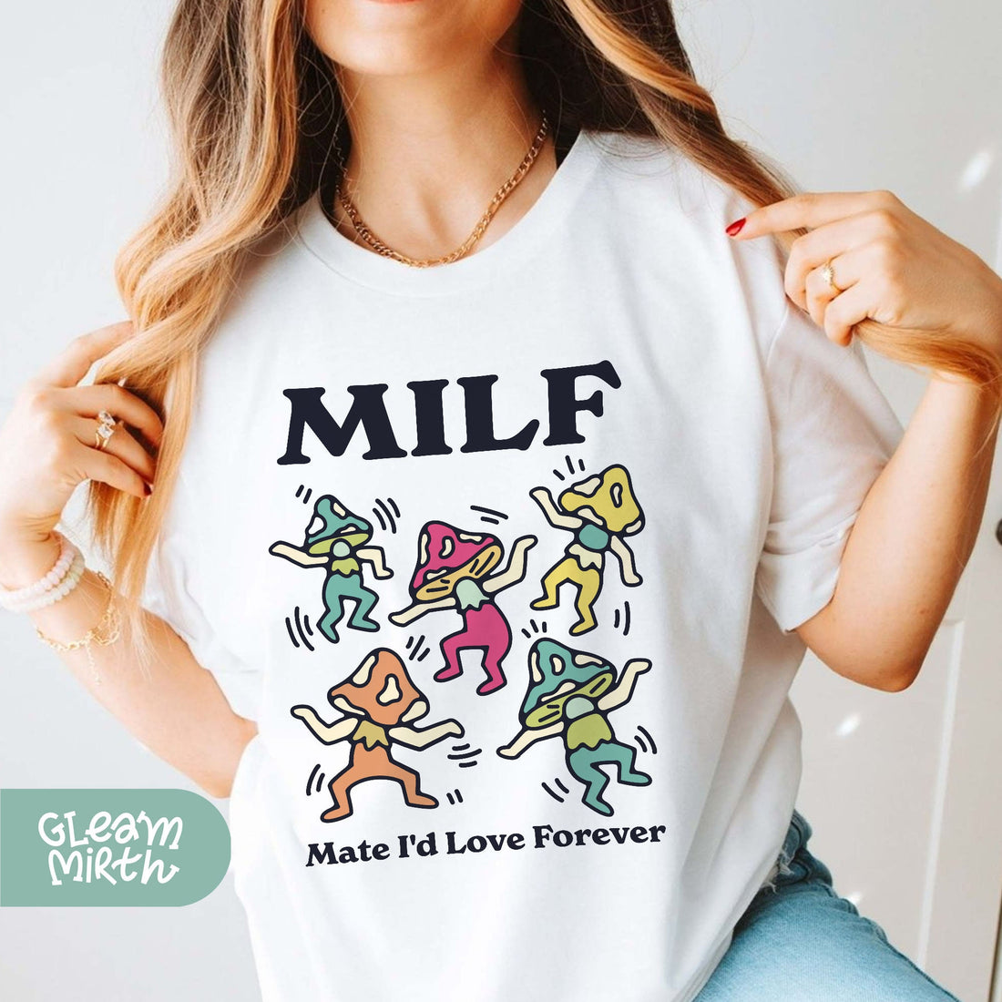 a woman wearing a t - shirt that says milf made it love forever