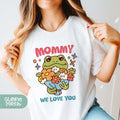 a woman wearing a t - shirt that says mommy we love you