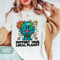 a woman wearing a t - shirt that says support your local planet