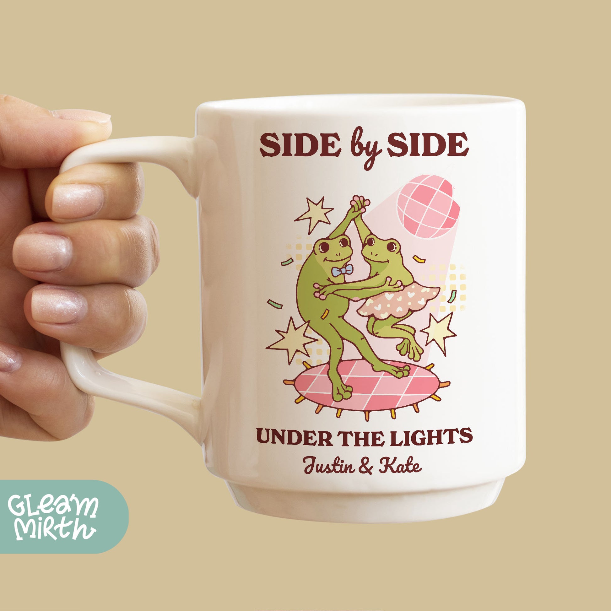 a woman holding a coffee mug with a picture of a dinosaur on it