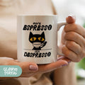 a woman holding a white coffee mug with a black cat on it