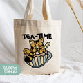 a tea time bag with a cat in a cup