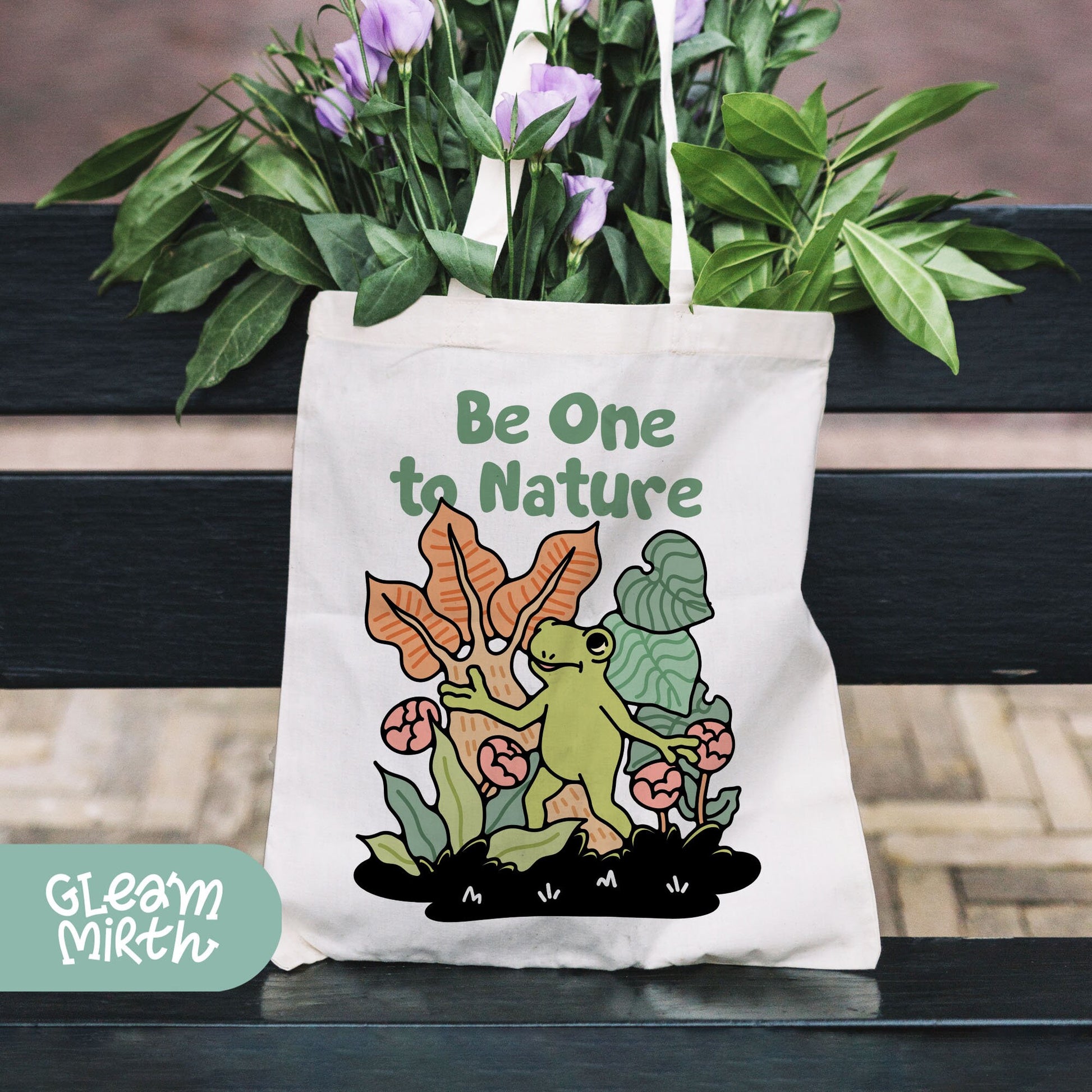 a tote bag sitting on top of a wooden bench