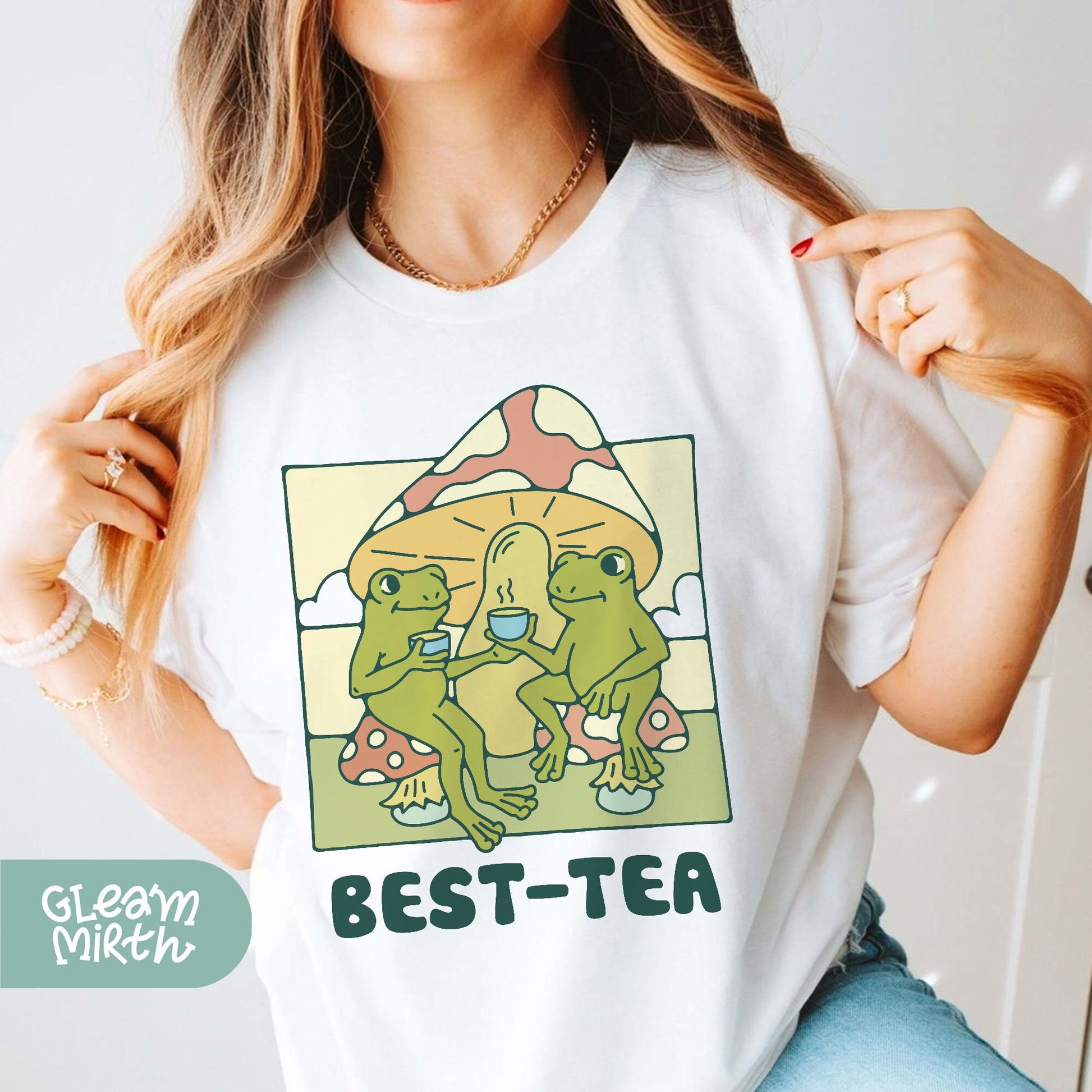 a woman wearing a t - shirt that says best - tea