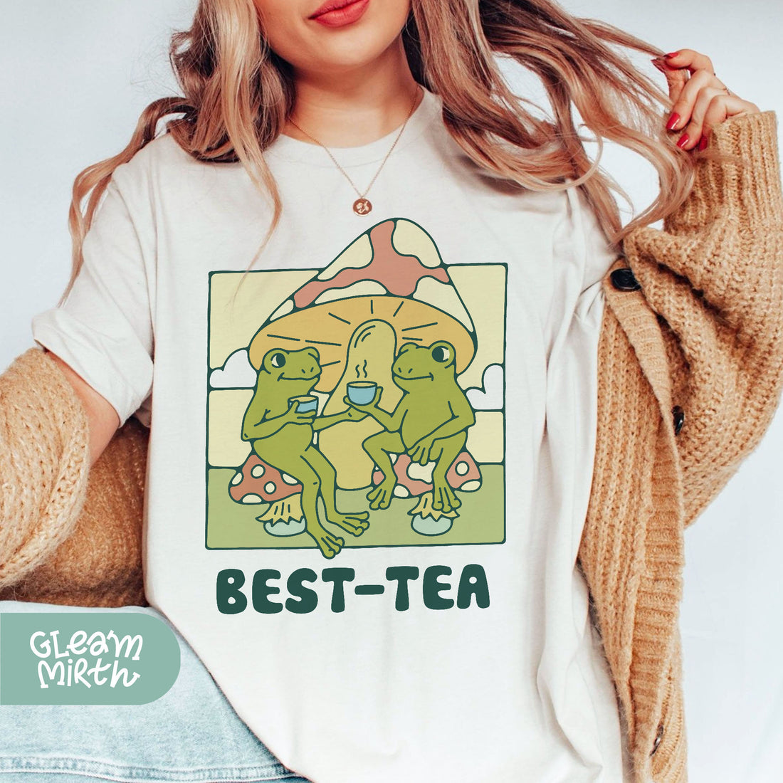 a woman wearing a t - shirt that says best - tea