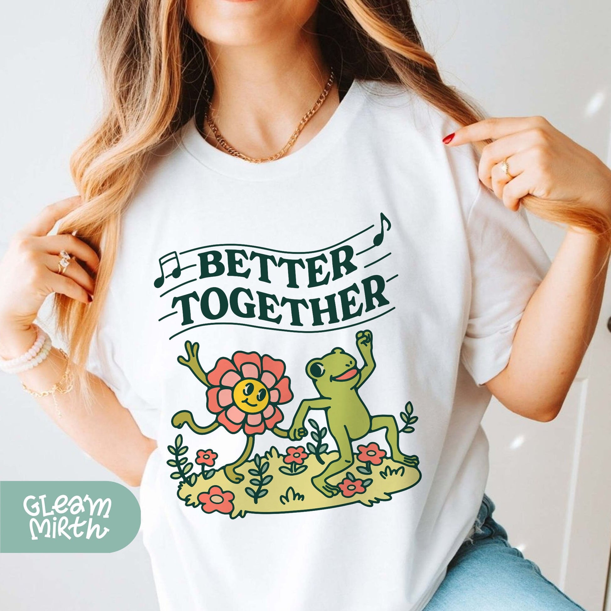 a woman wearing a t - shirt that says, better together