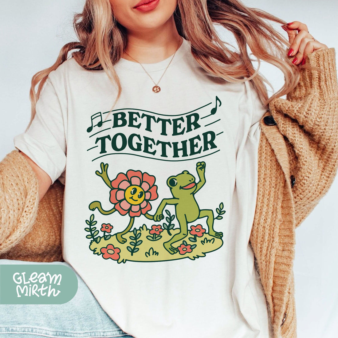 a woman wearing a t - shirt that says better together