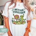 a woman wearing a t - shirt that says better together