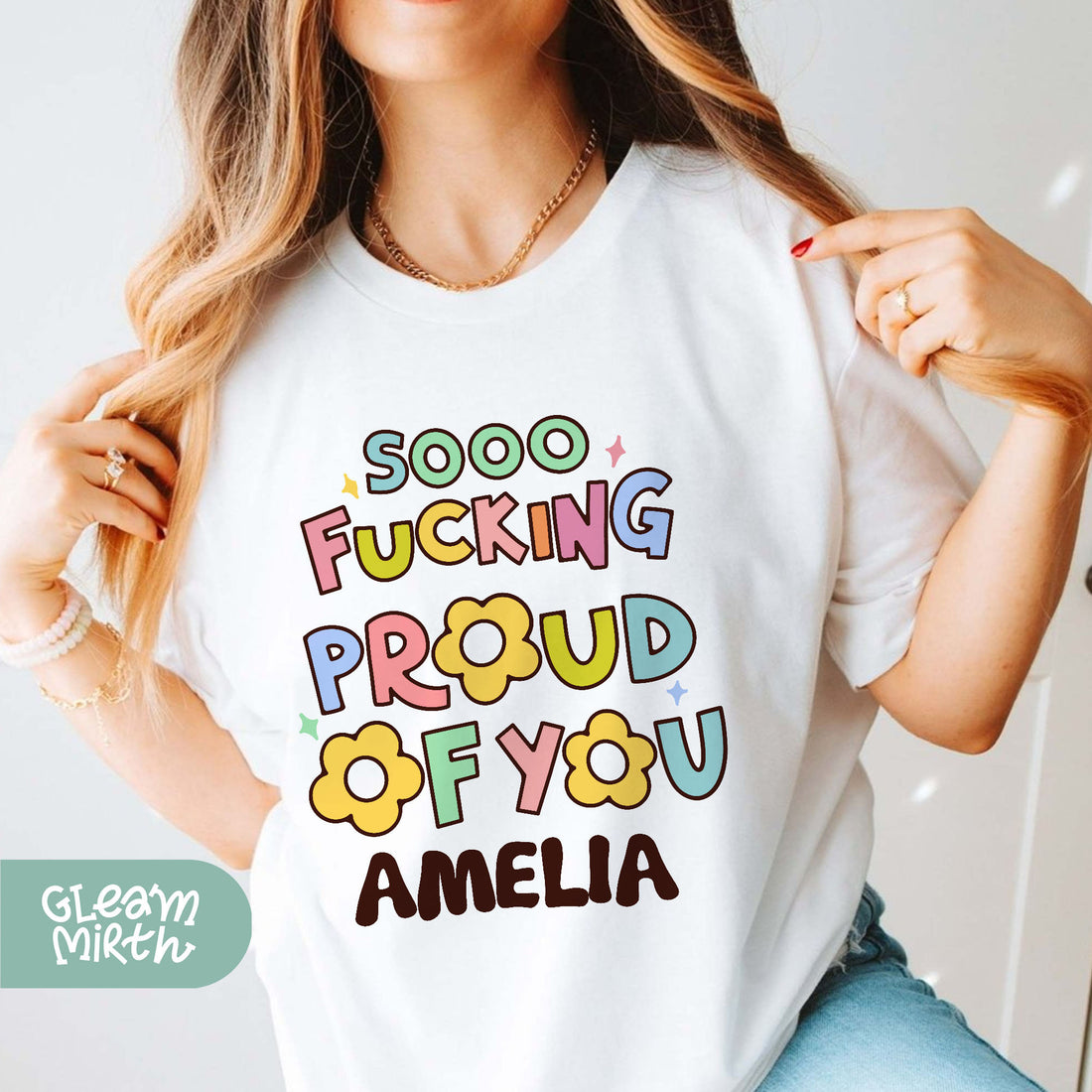 a woman wearing a t - shirt that says, sooo fucking proud of you