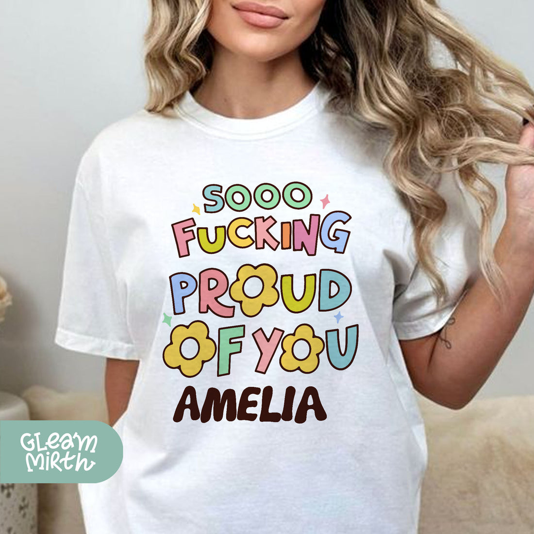 a woman wearing a t - shirt that says, sooo fucking proud of you