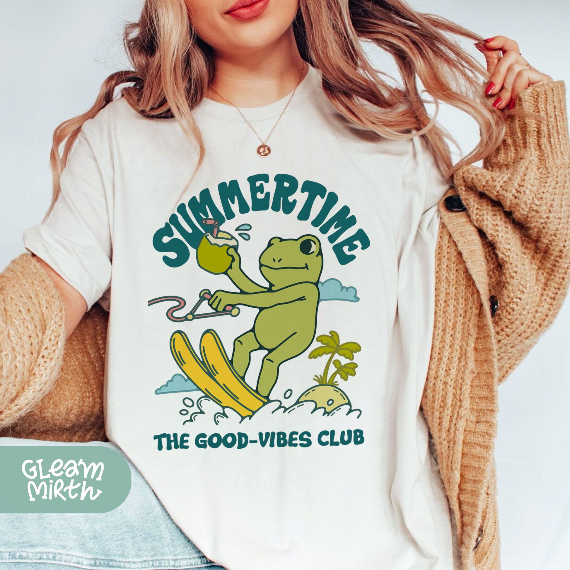 a woman wearing a white shirt that says summertime the good vibes club