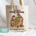 a tote bag with a picture of a frog on it