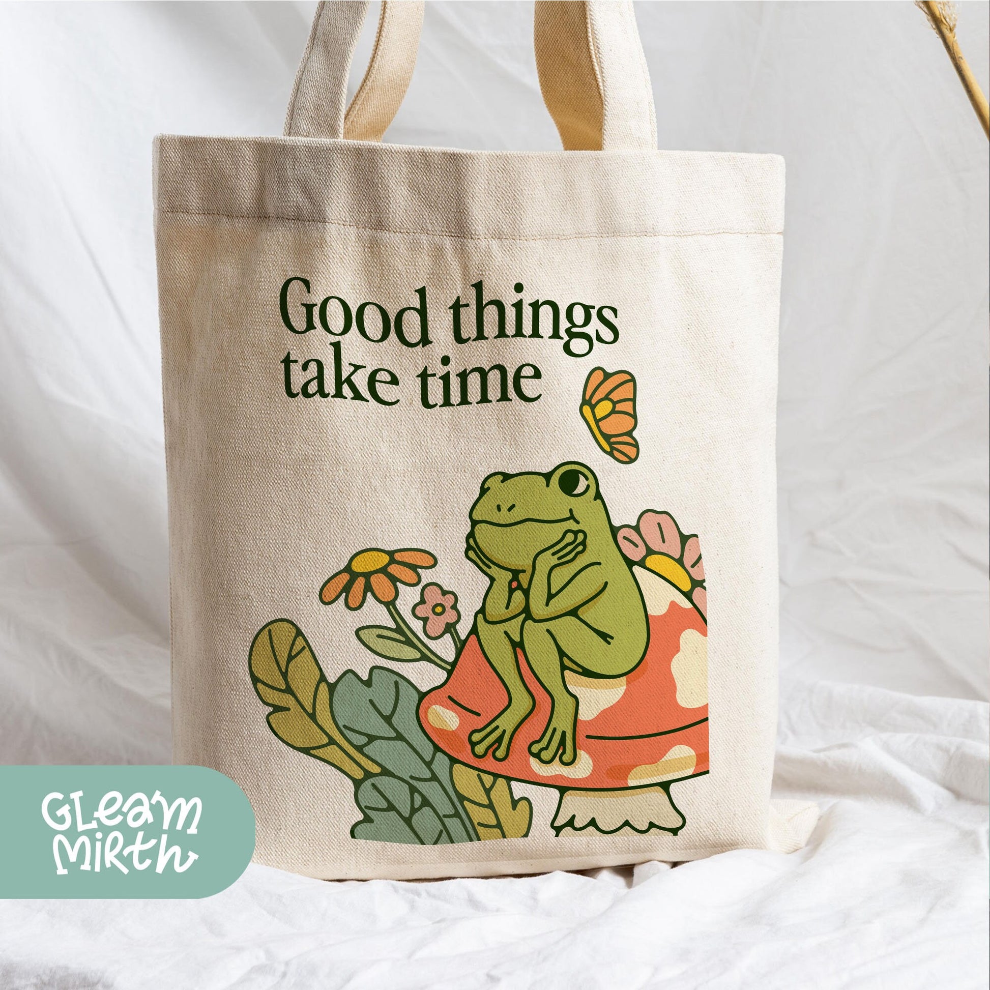 a tote bag with a picture of a frog on it